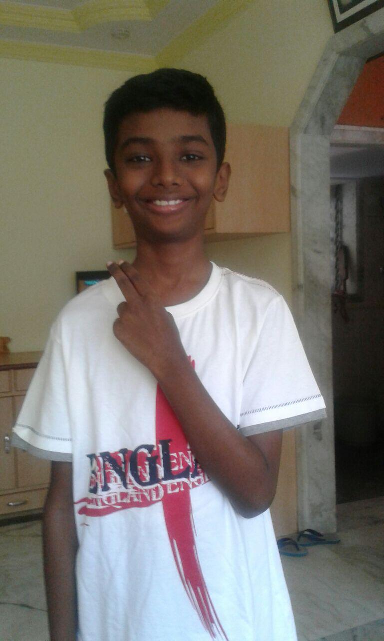 Can you see Sridhar is wearing an England T shirt?